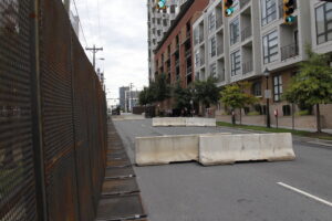 Temporary event fencing and concrete road blocks installed by Checkmate Global in Frederick, MD.