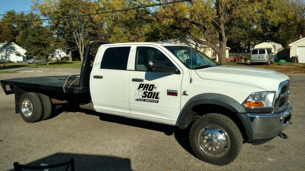 Temporary mesh fencing installed along a roadside by Pro-Soil Site Services, Inc in Lansing, MI