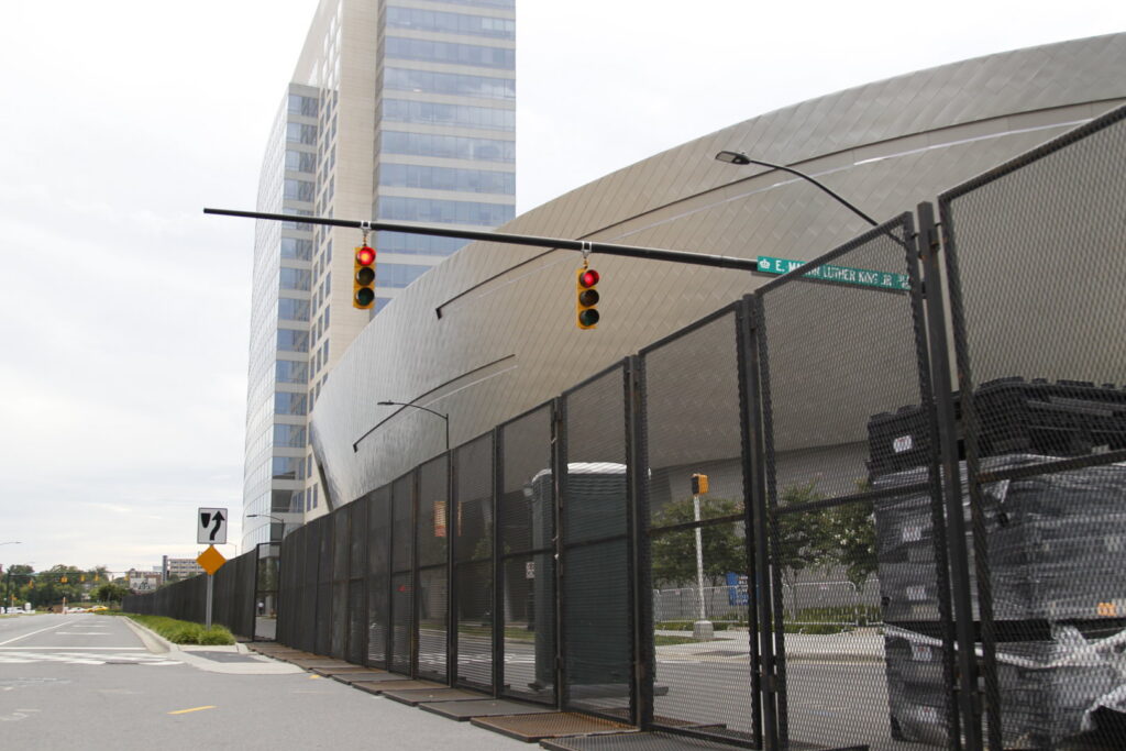 Temporary perimeter fencing installed along a street by Checkmate Global in Frederick, MD.