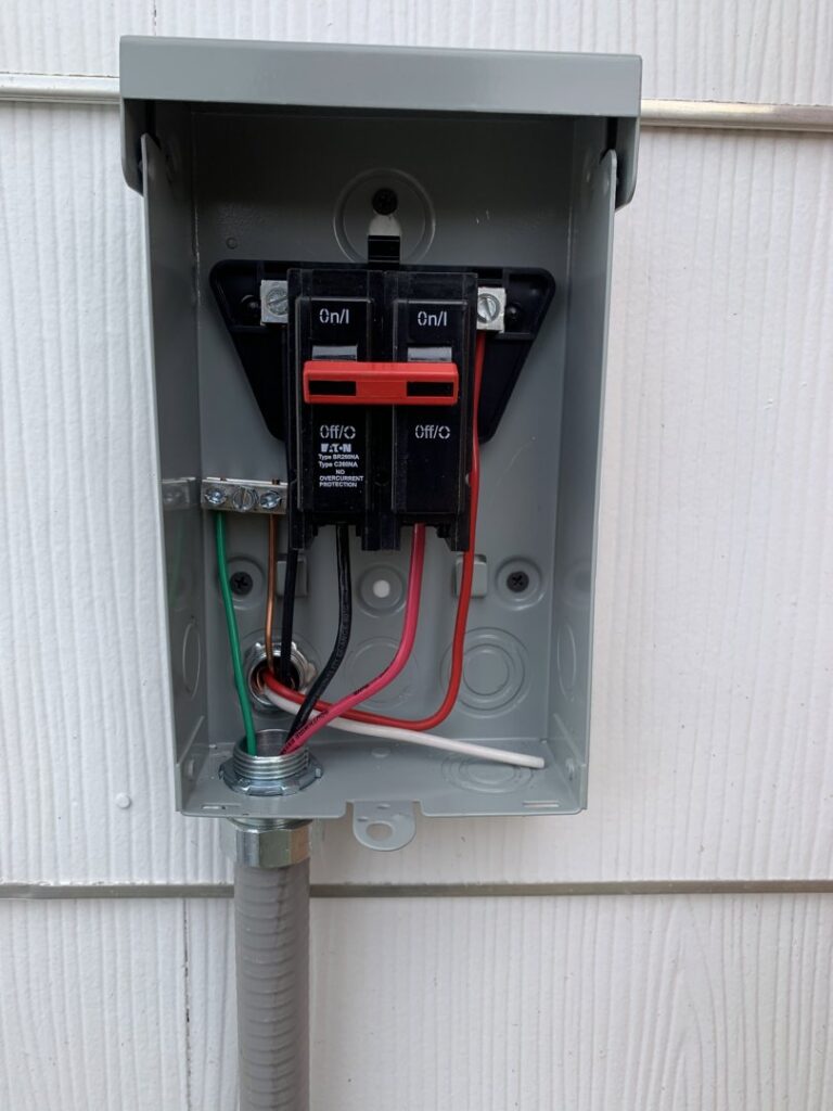 A large temporary power distribution panel with multiple outlets, set up by AMG Electric LLC Laramie, WY.
