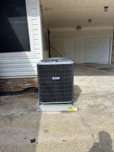 A Tempstar outdoor AC unit installed by Breezy Heating and Cooling in Mobile, AL.
