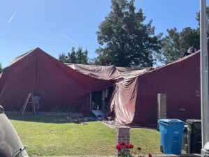 Technicians from Z Best Pest Solutions performing termite fumigation on a residential house in San Jose, CA.