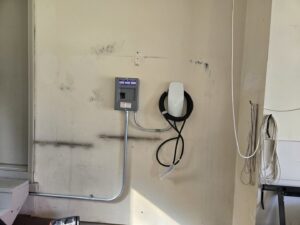 Tesla EV charger and dedicated electrical panel installation by JAL Electrical Construction in Hammond, IN.