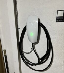 A Tesla wall connector professionally installed by ChargerPro in Denver, CO.