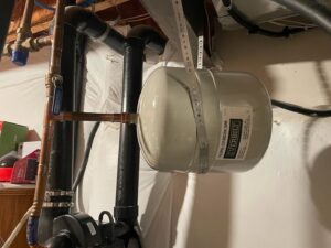 A thermal expansion tank and associated plumbing installed by National Heating & Cooling Company in Lakewood, CO.