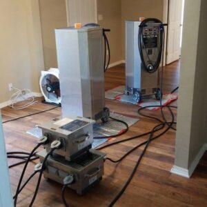 Thermal remediation equipment set up inside a room for pest control by Biotech Pest Management in Summerville, SC.