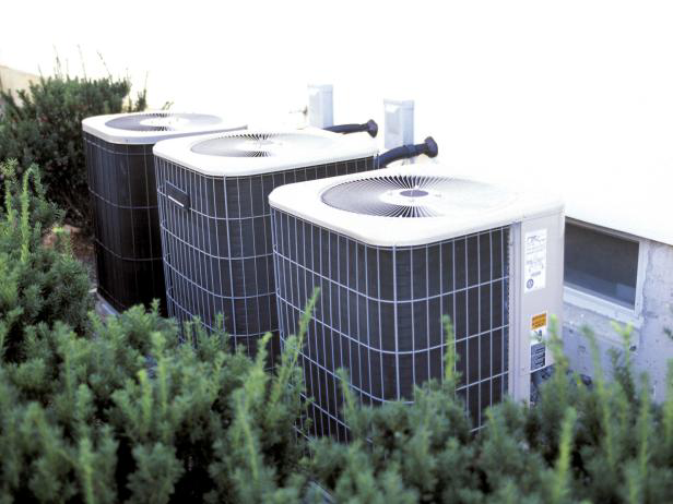 Three outdoor HVAC condenser units installed by Cool Concepts A/C & Heating in San Antonio, TX.