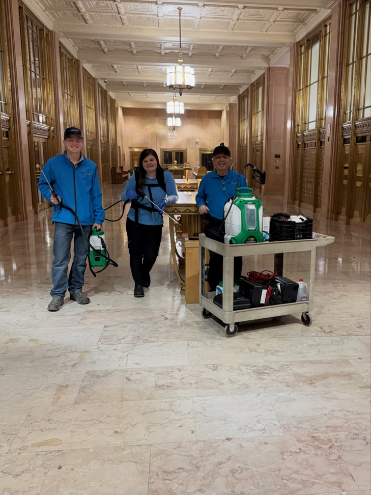 Three Pest Lock, Inc. technicians with sprayers and equipment ready for pest control in Vancouver, WA.