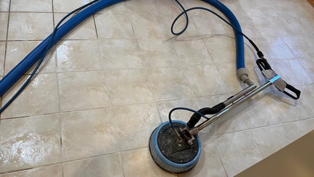 A rotary tool and hose used for professional tile and grout cleaning by Jason Lostetter Carpet Cleaning in New Glarus, WI.