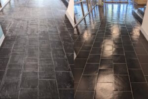 Before and after comparison of dark tile floor cleaning by Accent Carpet & Upholstery Cleaners in Pittsburgh, PA.