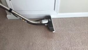 A tile floor showing a clear before-and-after of professional tile cleaning by Atlanta Top Force Carpet Cleaning in Roswell, GA.