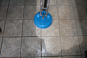 A professional tile and grout cleaning machine in action at Unlimited Carpet & Grout Cleaning in Las Vegas, NV.