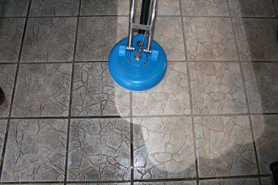 A professional tile and grout cleaning machine in action at Unlimited Carpet & Grout Cleaning in Las Vegas, NV.
