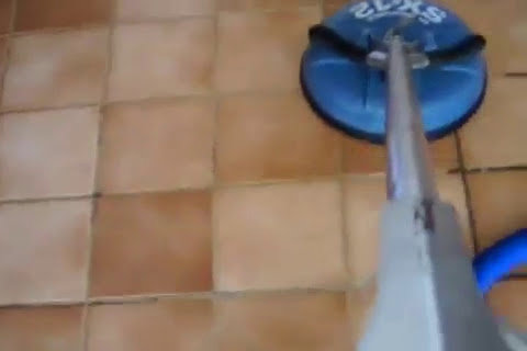 Close-up of a tile and grout cleaning process, highlighting the effectiveness of A Copesetic Carpet, Upholstery, Tile & Grout Cleaner in Mesa, AZ