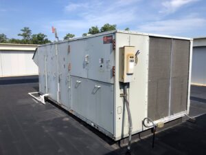 A large Trane commercial rooftop HVAC unit, serviced by Raleigh Comfort Services in Raleigh, NC.