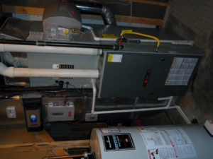 An indoor Trane furnace and water heater installation by Extreme Heating and Cooling II - Indiana, serving homes in Westfield, IN.