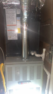 A new Trane furnace and air handler unit with ductwork installed by AirTech Solutions LLC in Broken Arrow, OK.