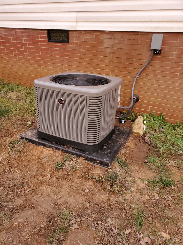 A Trane HVAC condenser unit installation by Barnette Heating and A/C in Mocksville, NC.