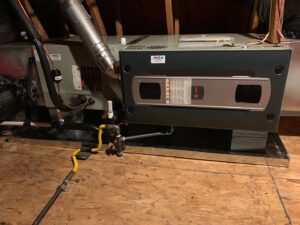 A Trane HVAC furnace and air handler unit installed in an attic by Delta Heating, Cooling, Plumbing in Wilson, NC.
