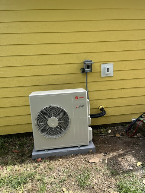 A Trane Mitsubishi mini-split condenser unit installed by CHIN Flower HVAC LLC in Murfreesboro, TN.