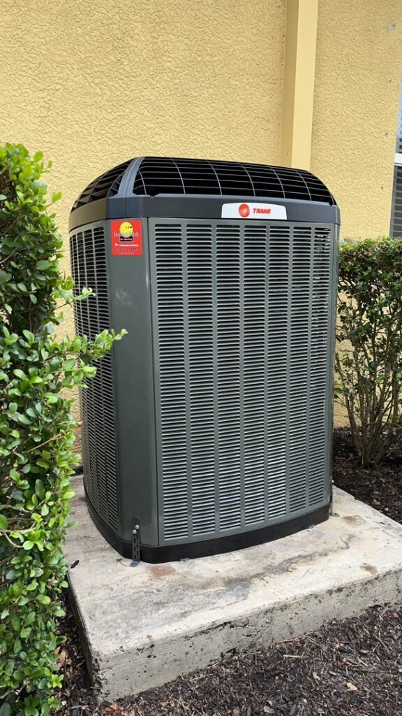 A Trane outdoor AC condenser unit installed by Southwest Florida Air Quality in Cape Coral, FL