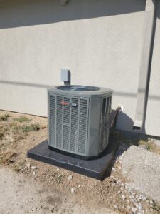 A new Trane outdoor air conditioning unit installed by Cloud Heating & Air Conditioning in Lawrence, KS.