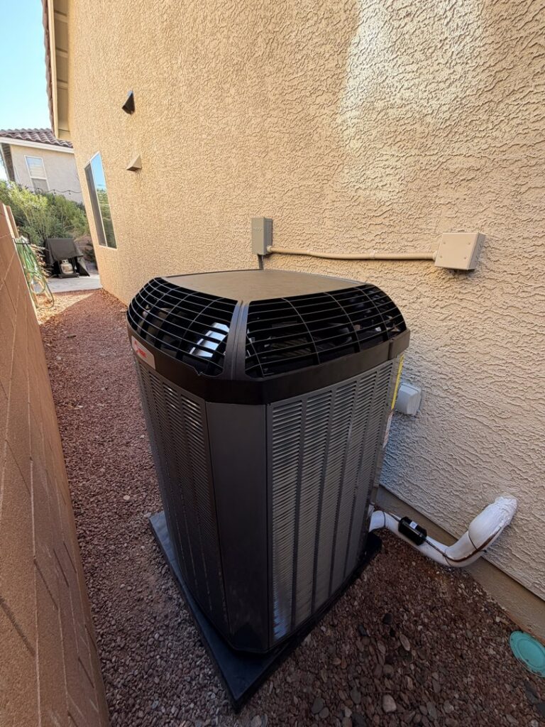 A Trane outdoor HVAC condenser unit installed by Blue Collar HVAC in Las Vegas, NV.