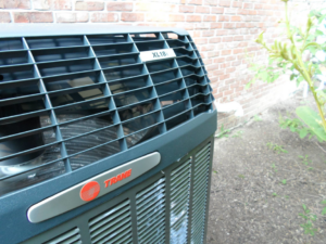 A close-up of the fan and coils inside a Trane XL18i AC unit, maintained by Extreme Heating and Cooling II - Indiana in Westfield, IN.