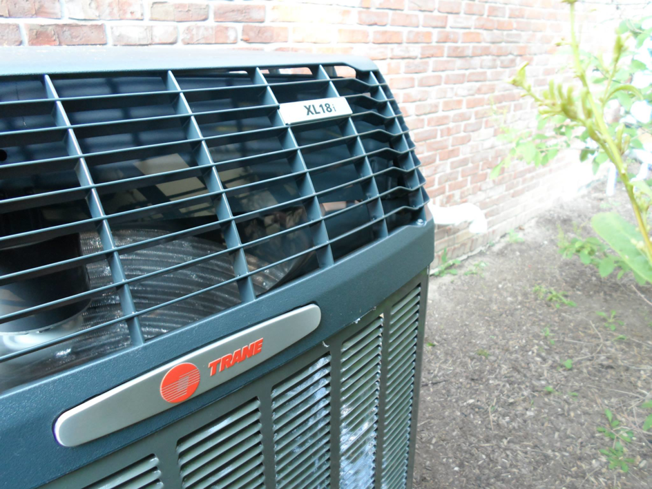 A close-up of the fan and coils inside a Trane XL18i AC unit, maintained by Extreme Heating and Cooling II - Indiana in Westfield, IN.