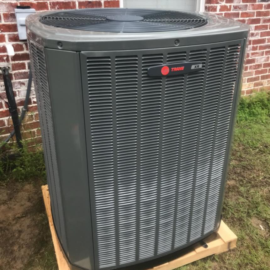 A newly installed Trane XR outdoor AC unit by Dodson A/C & Appliance in Biloxi, MS.