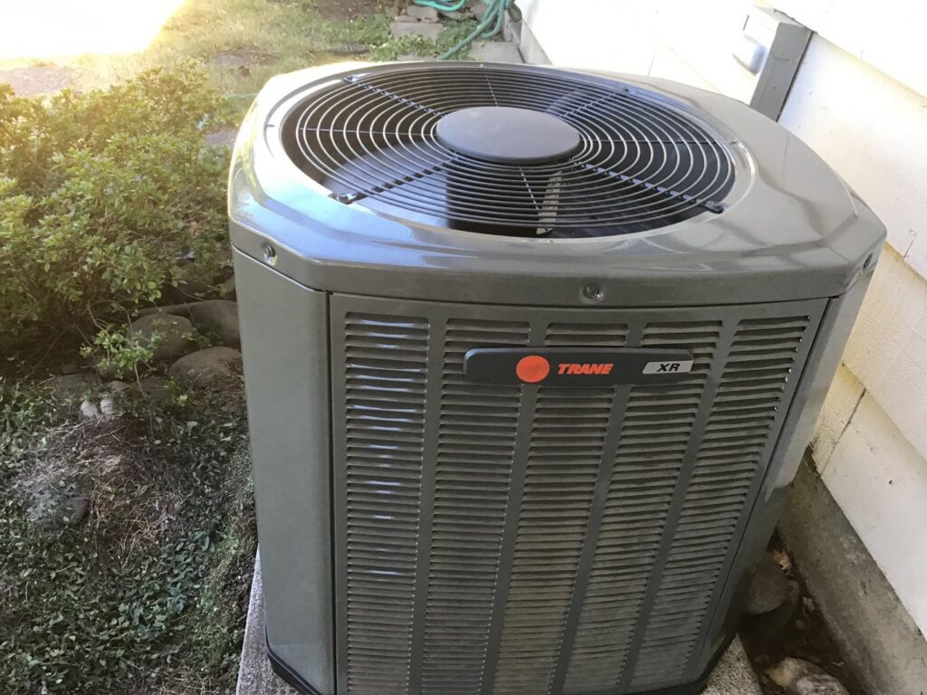 An outdoor Trane XR air conditioning unit, serviced by Southern Oregon Heating & Air Conditioning in Medford, OR