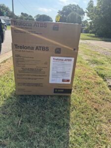 A box of Trelona ATBS Annual Bait Stations, a product used for termite control by Drapers Pest Management in Fort Worth, TX.