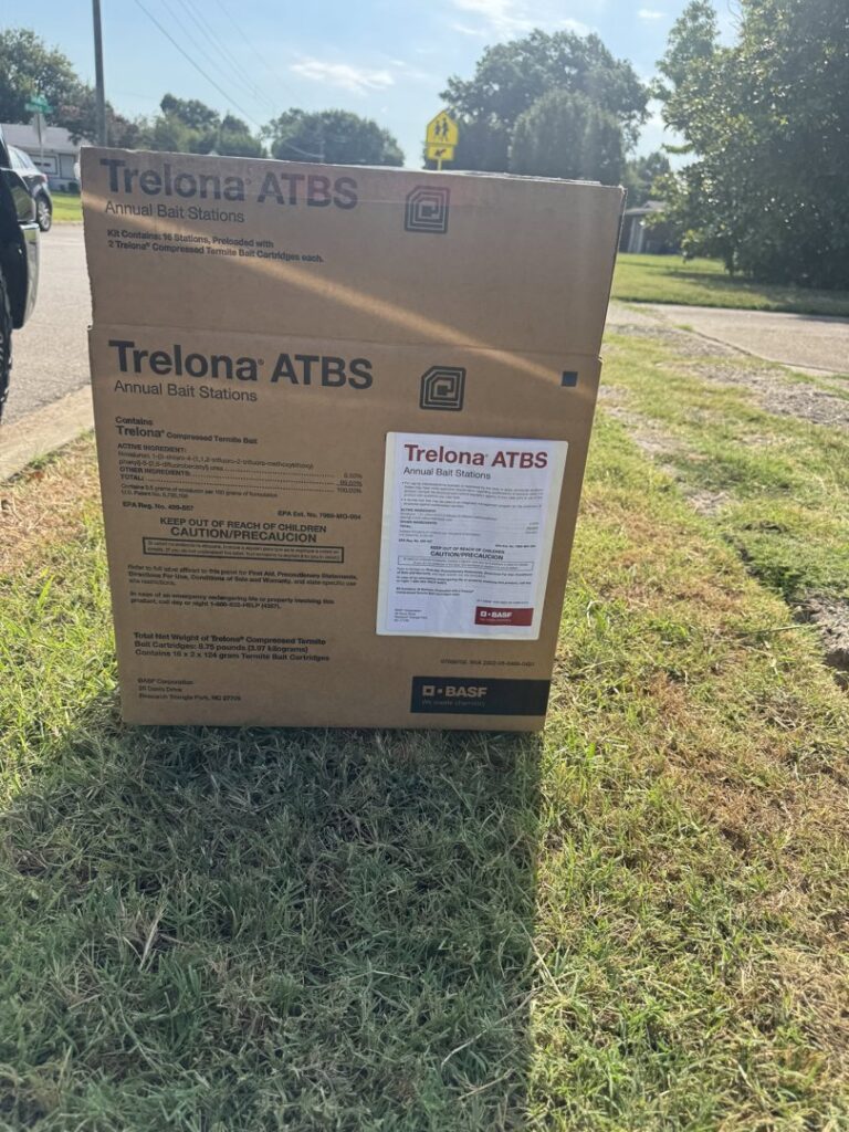A box of Trelona ATBS Annual Bait Stations, a product used for termite control by Drapers Pest Management in Fort Worth, TX.