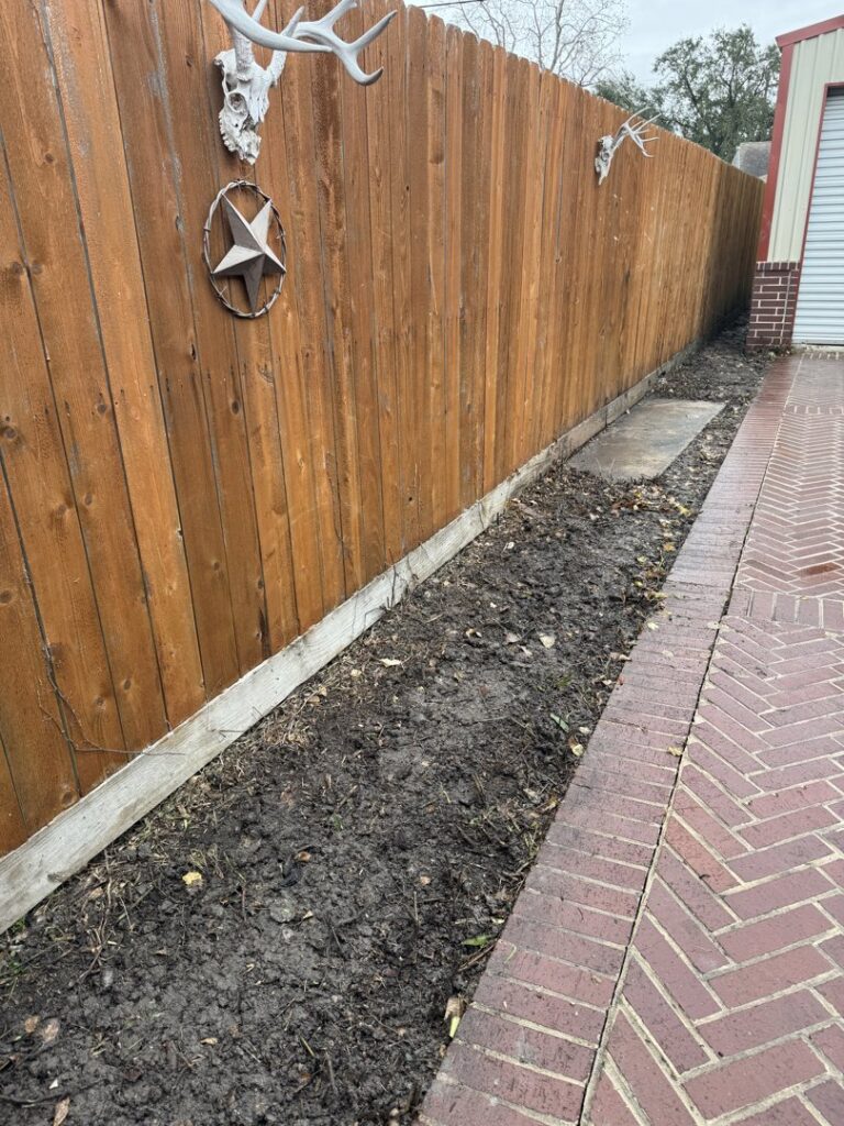 A trench dug for running electrical or gas lines for a generator installation by Never Without Power Generators LLC in Huffman, TX.