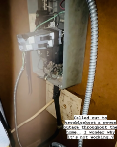 An open electrical panel being troubleshooted for a power outage by AO Electric Inc. in Sacramento, CA.