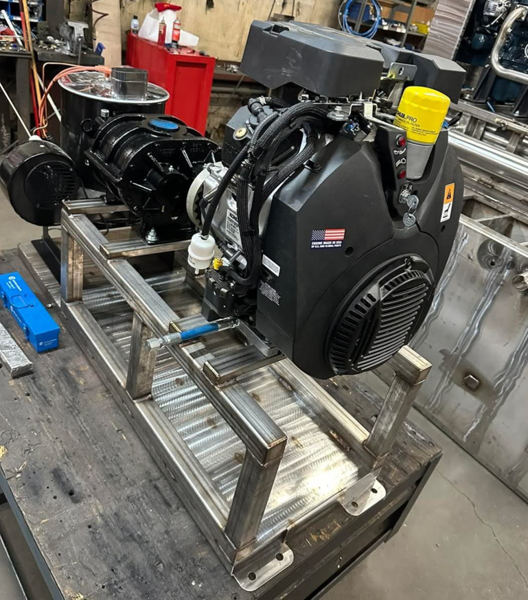 A truck mount carpet cleaning machine being assembled in the workshop at El Diablo Truck Mounts in Rapid City, SD.