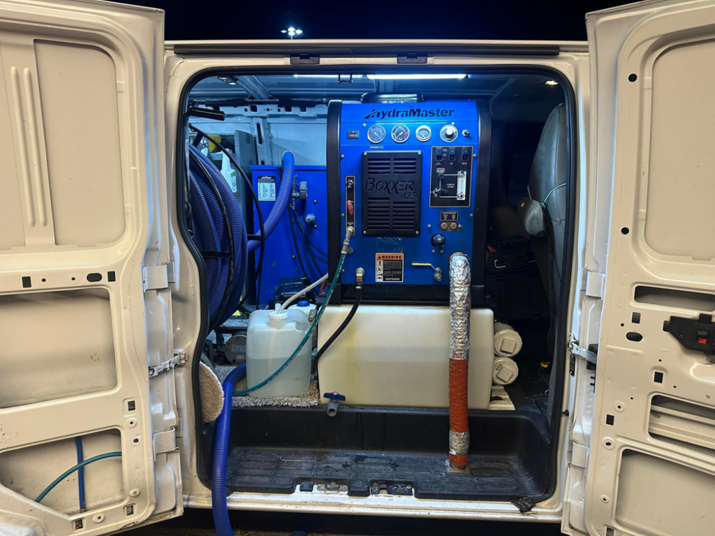A powerful truck-mounted carpet cleaning machine used by Evolution Clean Care in Knoxville, TN