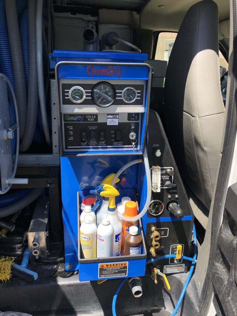 Interior of a Chem-Dry van with a truck-mounted carpet cleaning system and solutions, ready for Sunrise Chem-Dry in Glendale, AZ.