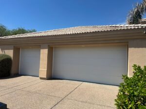 Two modern residential garage doors recently installed or repaired by Central Garage Door Repair LLC in Glendale, AZ.