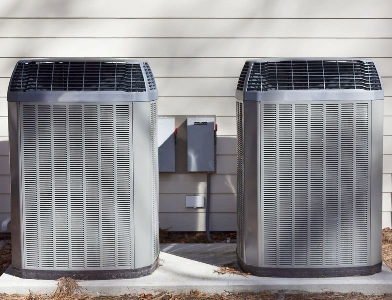 Two outdoor air conditioning units installed by Extreme Heating & Cooling in Beaver Dam, KY