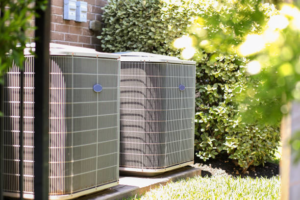 Two outdoor air conditioning units installed by Ferreira Mechanical, LLC in Fall River, MA