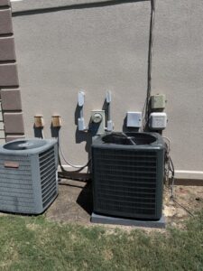 Two outdoor Goodman AC units installed by B&B Hvac Llc in Memphis, TN, providing reliable cooling.