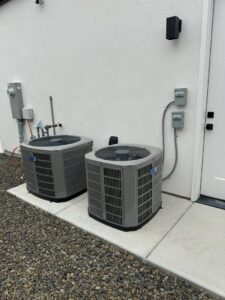 Two newly installed outdoor AC units for a home by Boise Valley Heating & Air in Meridian, ID
