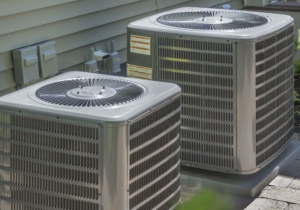 Two outdoor air conditioning units installed by Kanawha Valley Maintenance in Charleston, WV