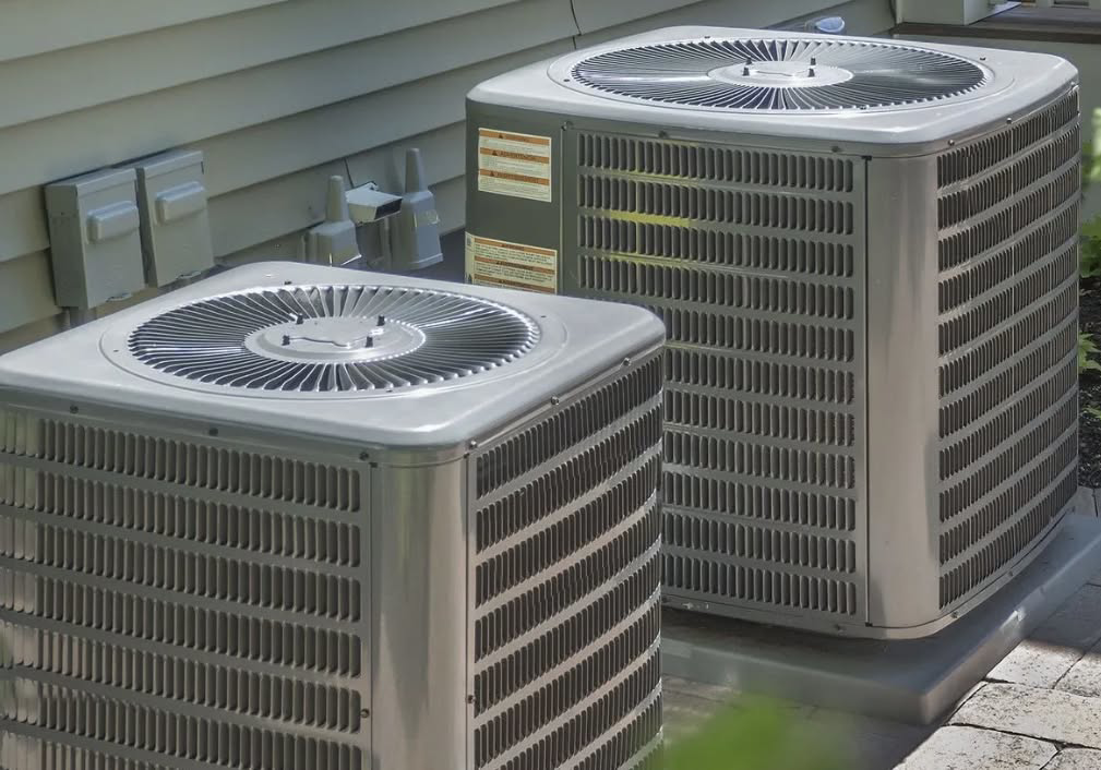 Two outdoor air conditioning units installed by Kanawha Valley Maintenance in Charleston, WV