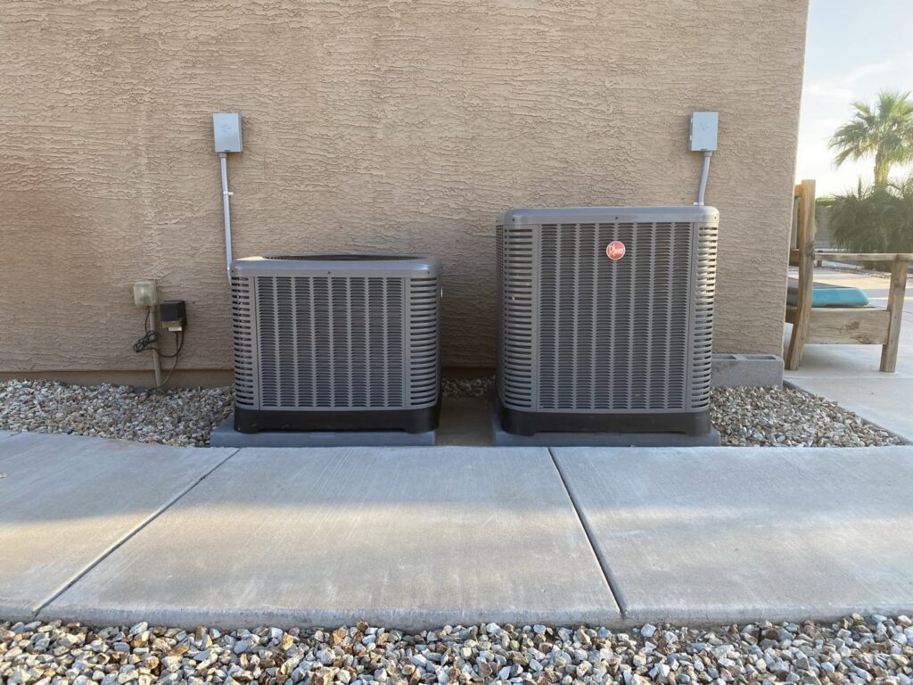 Two outdoor AC units installed side-by-side by Kings of AC, LLC in Queen Creek, AZ.