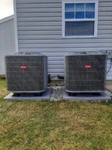 Two outdoor Bryant HVAC units installed side-by-side by Madison HVAC/R, Inc in Richmond, KY.