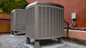 Two outdoor HVAC condenser units installed by Pioneer Heating and Cooling in Kalispell, MT