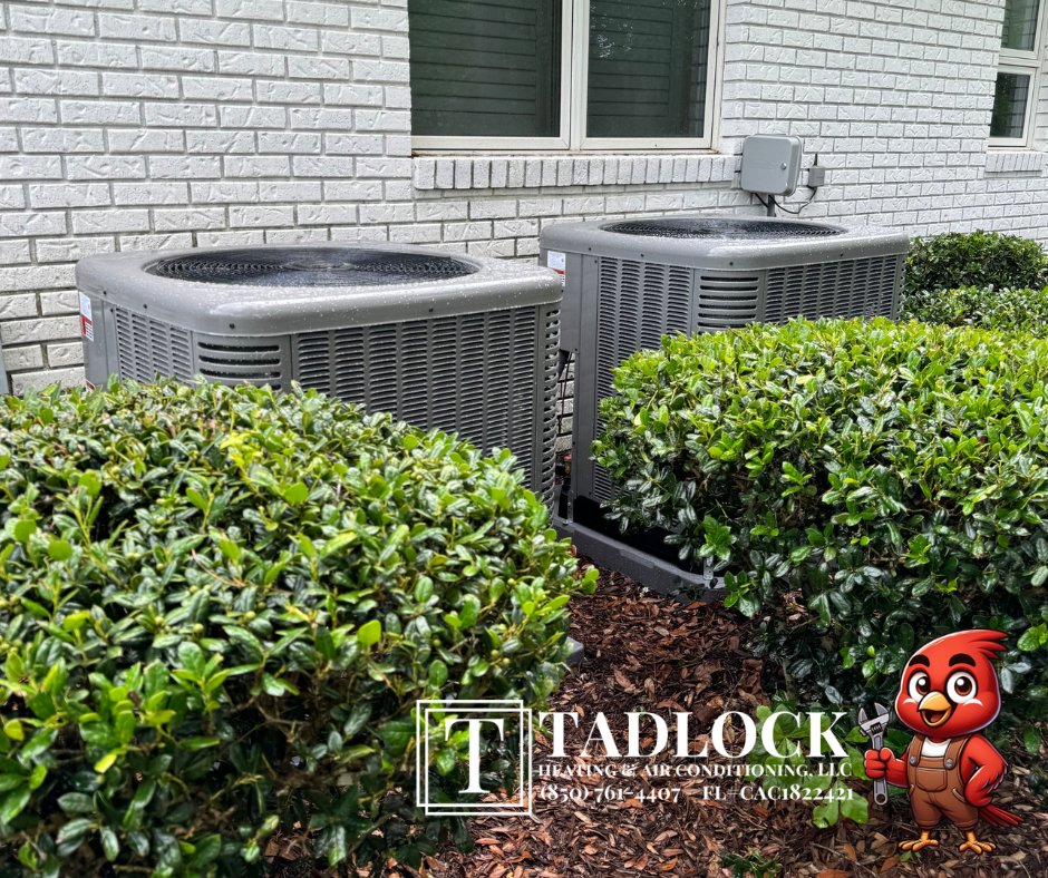 Two outdoor HVAC units installed by Tadlock Heating & Air Conditioning in Tallahassee, FL