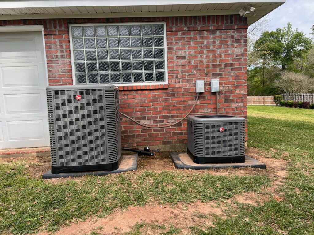 Two Rheem outdoor AC units professionally installed by Johnson's A/C & Heating in Alexandria, LA.
